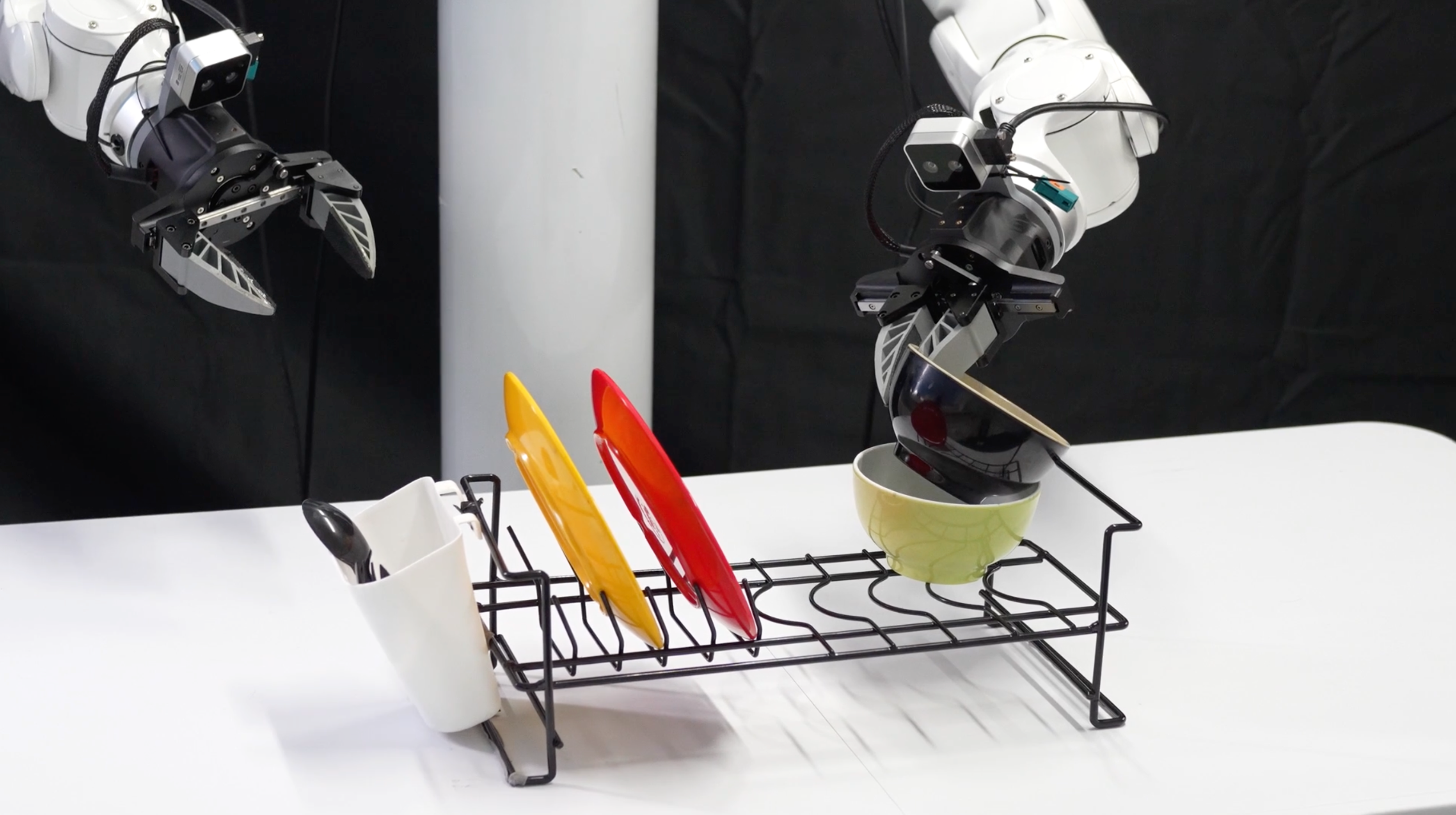 A dual-arm robot performing a long-horizon desk organization task